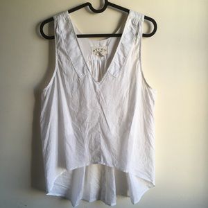 Study New York brand white flowy tank